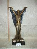 Art deco woman metal statue, unsigned - origin unknown.