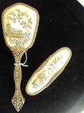 Ladies vanity brush set, filigree handle and trim, needlepoint inserts.