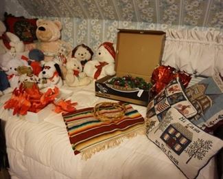 bed with stuffed animals