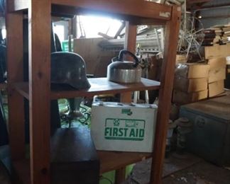 helmet, watering can, first aid kit