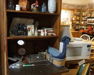 bookcase, microwave, cart, cookbooks