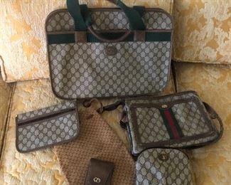 Faux and authentic Gucci purses and make up bags