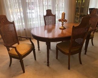 Dining room table with 4 side chairs and 2 captains chair; includes 2 leafs and pads.....