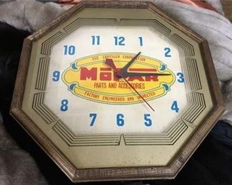 Lot 006
Mopar Parts And accessories Chrysler Corporation advertising clock