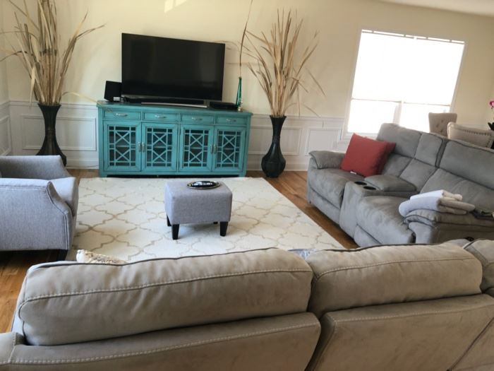 sofa is 7ft. 2 inches width 35.3 seater lounger pull out on both side usb on both sofas.  smaller  couch is 6'3inches 2 seaters width 35 with cup holder.  Tv is curved samsung 55 inches with sound bar and speaker