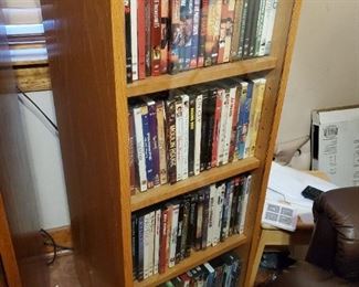 Wood Cabinet with Glass doors. Unit swivels to revel storage on both sides. Perfect for DVD's, CD's and VHS 2 cabinets Available. $30 each - Total $60. Cabinets can be bought individually