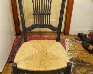 48" Oak Round Table with 5 Chairs. Chairs are wood with woven seats. 4 Chairs and 1 arm Chair. 24" Leaf - $300