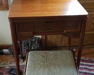 1950's SINGER 401a Slant 7 Sewing Machine in a Mid-Century Cabinet and chair - There additional feet, button hole attachment and metal bobbins - $450