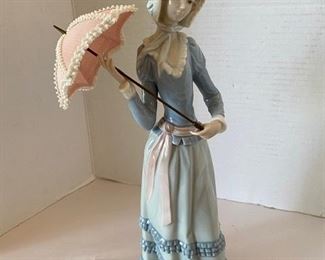 #30 Lladro Lady with Umbrella  1’ x 6”$  60
