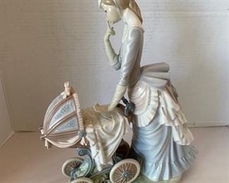 #35 Lladro Young Lady with Carriage #42 13.5” x 10”x 5”	$225
