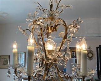 #65 Dining Room crystal chandelier (German chandelier purchased in England)in the manner of Schonbek  25”H x 23”W	5 arms	$495
