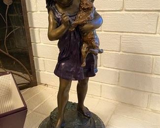 #103 Bronze Statue  ‘Girl Holding Cat” 11/675  by De Jeranieri  20.5H 	$225

