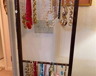 Costume jewelry earrings and necklaces