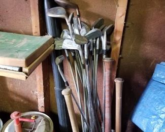 Old baseball bats and golf clubs