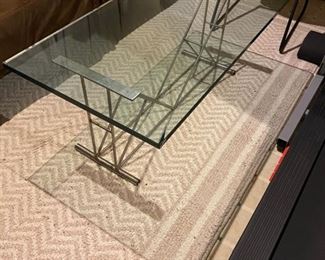 Glass coffee table with metal base 