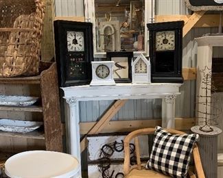 Antique Edwardian wood pillar mantle, buffet, entry mirror with beveled glass, antique and vintage wind up clocks