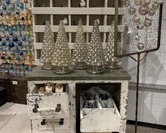 Antique medical cabinet, mercury glass Christmas trees, vintage angels, decorating pines in many sizes, vintage ornaments