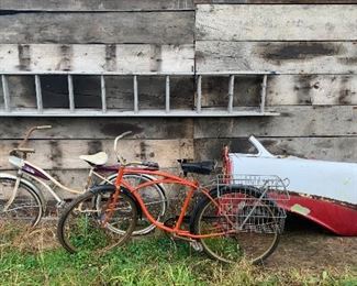 Vintage bicycles, vintage 1950’s automobile rear quarter finned body panel