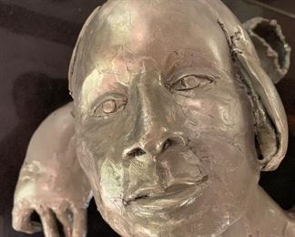 Metal sculpture by California artist -hand is actually a separate sculpture