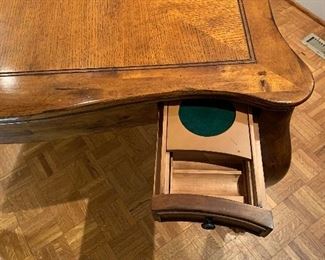 Game table -keep your chips here and your drink on the coaster of the pull out drawer.
