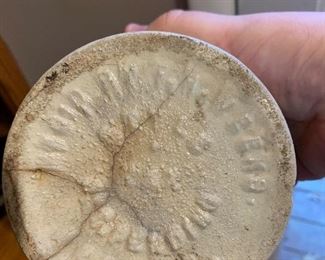 Bottom of the antique crock/pottery piece