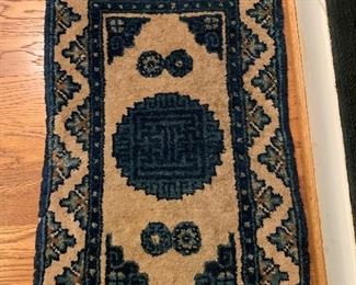 Small Asian wool rug
