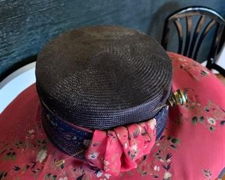 Asian straw hat with hatpin