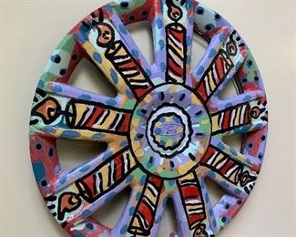 Painted hubcap found art folk art