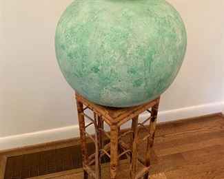 Large vase on bamboo stand