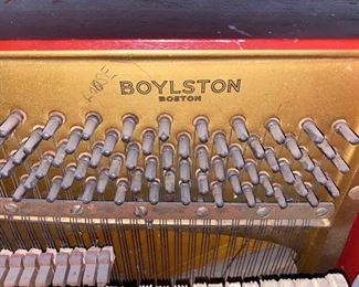 Leather-covered speakeasy piano.  Only 44 inches wide, 40 inches high, 22 inches deep from front to back.  The keyboard is 36 inches across.  It is needs much work.  