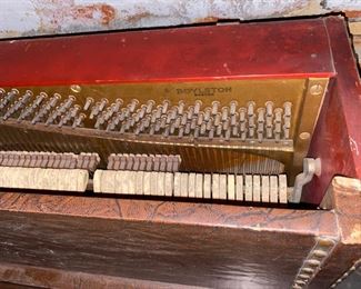 Leather-covered speakeasy piano.  Only 44 inches wide, 40 inches high, 22 inches deep from front to back.  The keyboard is 36 inches across.  It is needs much work.  