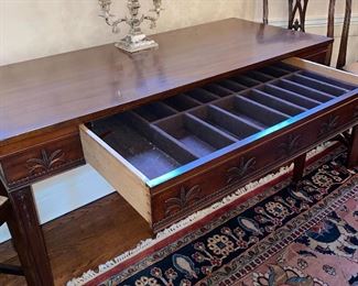 Mahogany table, decorated on all sides, with on "hidden" felt lined silverware drawer