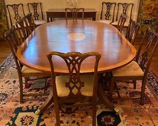 Custom hand crafted dining table and 12 Antique sidechairs