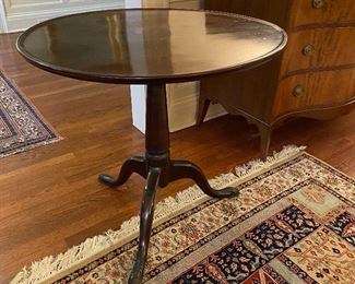 Antique tilt top table
