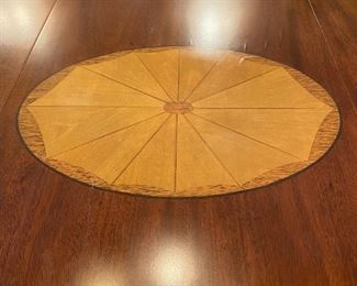 Custom hand crafted dining table by R. T. Hogg.  Extends to 96" long from 60" round.