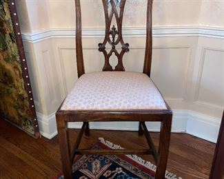 One of a set of 12 antique side chairs