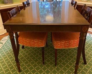 Custom hand crafted dining table and set of 6 period Regency chairs.