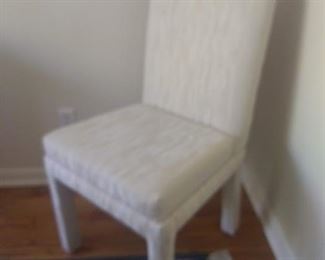 Set of 8 upholstered Dining Chairs like this one.