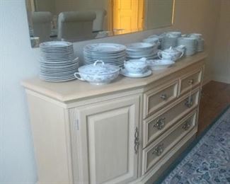 Lexington Buffet with 4 Drawers and 2 Doors with shelves inside.