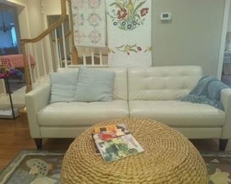 Macy's Leather Mid Century Design Sofa, Patchwork and Applique Quilts, Pottery Barn Woven Coffee Table.