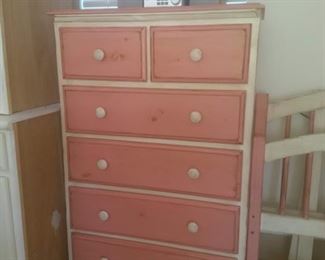 Pink and Cream Color Dresser with 6 Drawers and matching Twin Beds which can be set up as Bunk Beds. 
