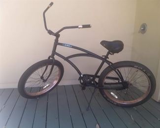 Beach Bike with tires made for riding on sand.