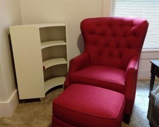 Red chair and ottoman from Imperial Furniture.