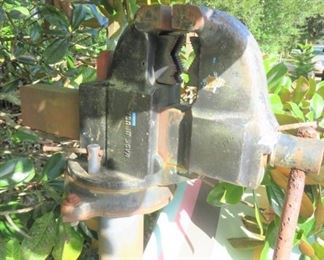 Huge Vice mounted on an Antique Ford Truck Rim with 4" Pipe & Plate