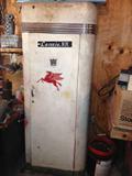 Vintage Mobil Pegasus Horse on cabinet