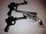 Rare Buck Rogers Toy Guns along with a Texan
