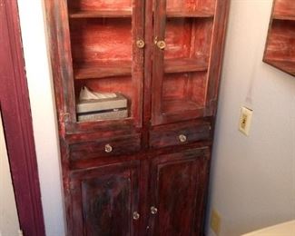 red bathroom cabinet