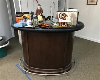 Portable bar with assorted barware and other items