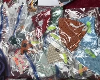 Handmade masks and mask holders.