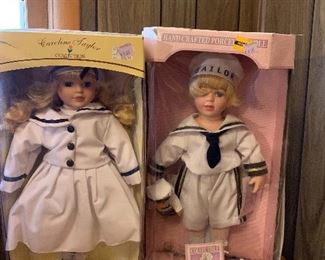 Large assortment of porcelain dolls